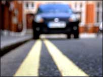 Car and yellow lines