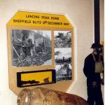 Display of bomb, at Kelham Island, with photographs showing damage to properties affected during the Sheffield blitz