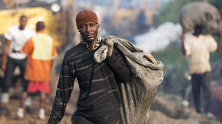A scavenger at the Olusosun rubbish dump in Lagos
