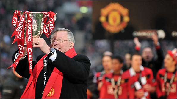 Sir Alex Ferguson holds the Carling Cup