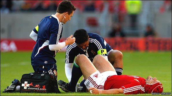 Lions forward Euan Murray receives treatment during the Kings match