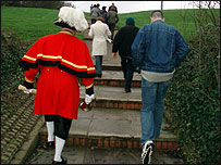 People walking up steps
