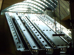 Escalators at Canary Wharf by Dmitri Herders
