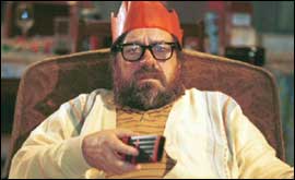 Jim Royle watching TV 