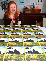 Laura Burgess with copies of her travel guide