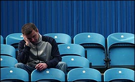 A fan on the terraces - dejected or meditating