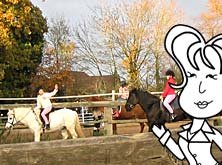 Alice watching children riding ponies