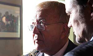 Roy Barraclough as Reverend Onan Van Kneck 