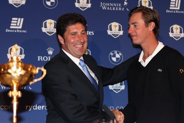 Jose Maria Olazabal (left) welcomes Nicolas Colsaerts to the European Ryder Cup team