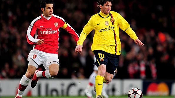 Cesc Fabregas and Lionel Messi