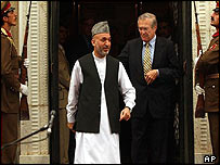 کرزئی، رمسفیلڈ