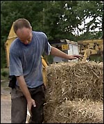 Man positions straw