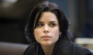 Neve Campbell plays Holly Dernay