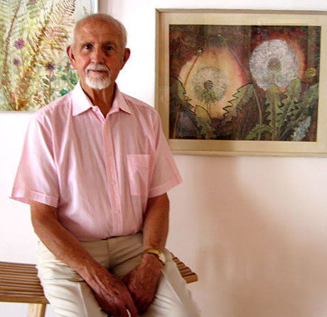 Stan Jones pictured with some of his art work