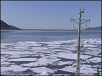 Ship cutting through sea ice in Svalbard.