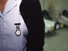 Nurse's watch on chest at Guys Hospital