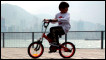 Boy on a bicycle. Getty/AFP