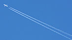 Aeroplane in the sky with vapour trail