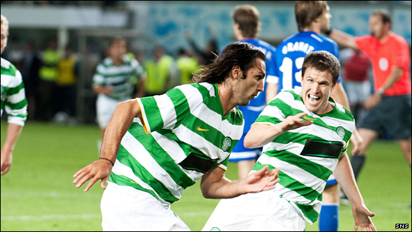 Georgios Samaras wheels away after firing Celtic to victory over Dinamo Moscow