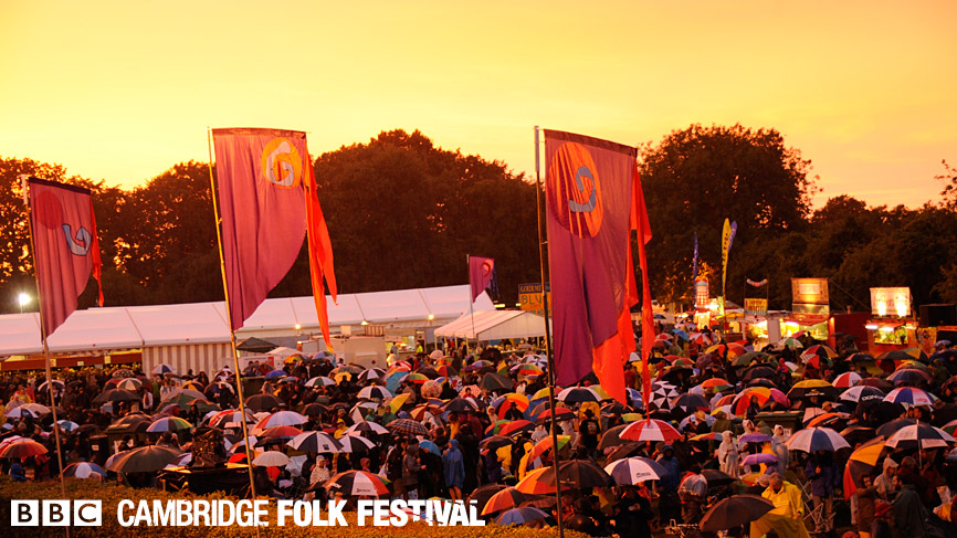 As Saturday's evening storms start to ease off, the festival goers relax into another beautiful Cambridge evening.