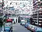 Photograph of a street decorated with bunting