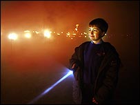 Young boy watching phoenix burn