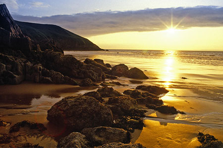 Seashore, rocks and sunset, photo by Tom Ang