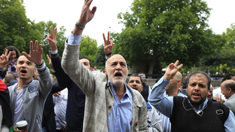 Libyan opposition supporters outside the Libyan embassy in London