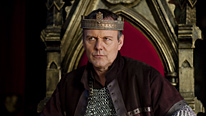 Uther (Anthony Head) wants to stamp out magic once and for all in Camelot
