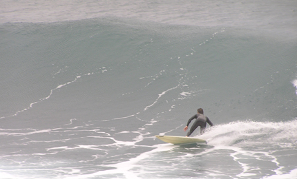 Bottom turn. Joe Williams finds dawn perfection, Madeira 06. Pic: Mark