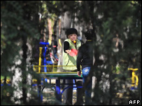 Women playing ping-pong at a Park in Beijing