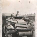 Queenie and Curly posing on one of 'A' Squadron's Half-Tracks