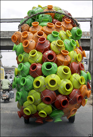 Water carriers on rickshaw