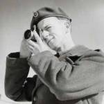 Me with my Robot wind-up automatic camera in Flensburg while in the Army of Occupation,1947, bought illicitly with my army ration of cigarettes, as I didn't smoke!