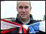 Ian Cheeseman with City and United scarves