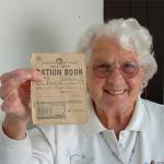Jean Winnan with her father's ration book. He was called William Leslie Bolitho and he lived at Glenview in Penryn