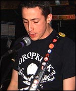 Guitarist performing in pub