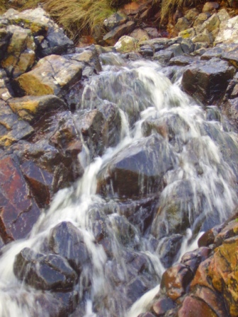 The wee burn that spills onto the beach