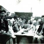 The adults are (L-R) Margaret Nelmes and Joyce Sturman. The children are (L-R) Hilary Wignell, Mary Hunt, Ezra Bend, Sylvia Bend, Barbara Storey, Ronnie Bend, Ettie Newton, Lillian Newton, Dennis Headworth and Carol Fletcher.