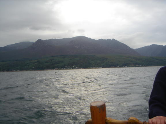 Porpoise from the Longship with Arran behind