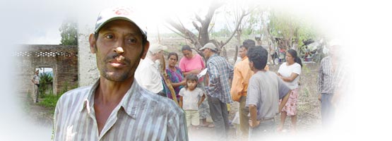 Mike in what remains of the dormitories for foreign volunteer coffee pickers at La Suana farm, Nicaragua. Evaristo, worker at La Suana coffee farm. Coffee farmers protesting alongside the PanAmerican highway, demanding legal titles for their land.
