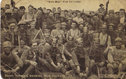 Happy "Tommies" wearing Hun helmets