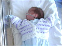 Baby Jack in his new cardigan