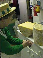 Cheese being cut