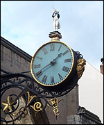 A clock on the outside of a building