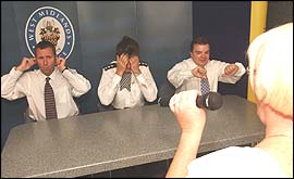 Police judges listen to terrible singer