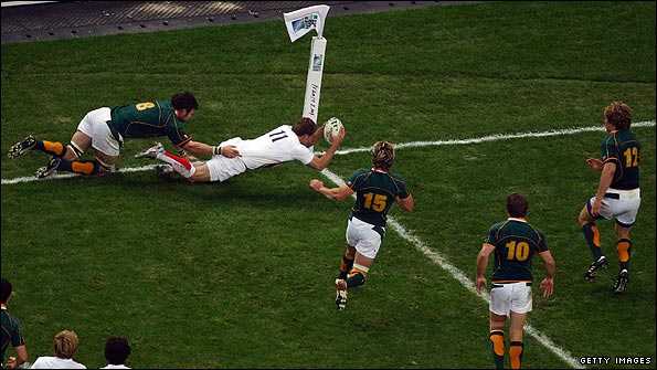 Mark Cueto prepares to touch the ball down but his try is ruled out