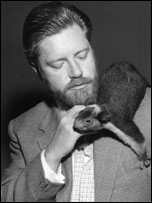 Gerald Durrell with animal on shoulder