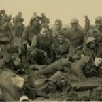On the back of this photograph my father wrote "My comrades and friends evacuated from Dunkirk - To my mother - Sydney Arthur Hewer"