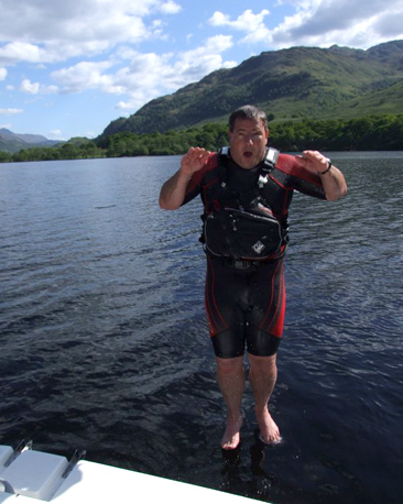 Man jumping into Loch Lomond